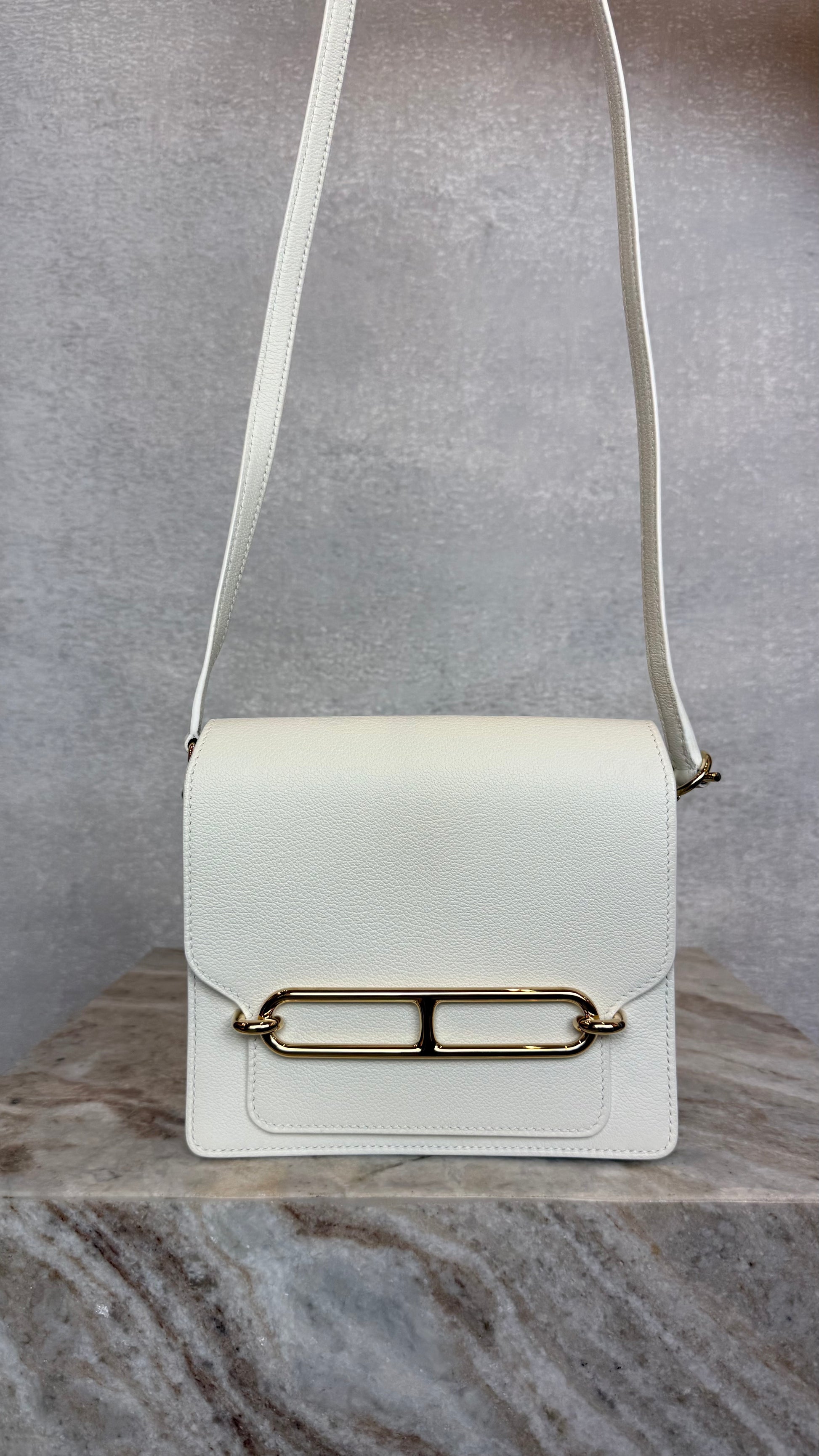 white gold hermes roulis crossbody